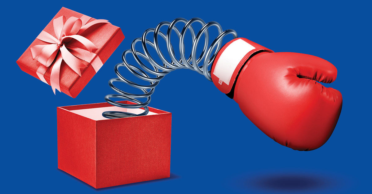 Boxing glove coming out from a gift box online discount